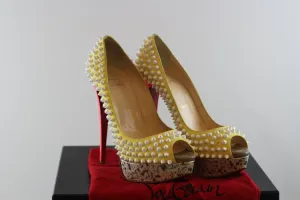 Canary Yellow Lady Peep Spike Pumps